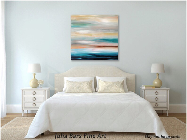 May include: Abstract painting with horizontal brushstrokes in shades of blue, green, brown, and white. The painting is hanging above a white bed with a white headboard and white bedding. Two white nightstands with drawers are on either side of the bed.
