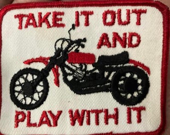 1970s sew on patch dirt bike "take it out and play with it"