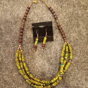 A necklace of Gaspeite, Sterling Silver and  Red Jasper beads