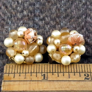 Pair of vintage mid century clip on earrings-soft cream and yellow cluster beads-Hong Kong