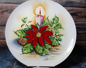 Ucagco Christmas plate-lit candle with poinsettia-signed J Macy