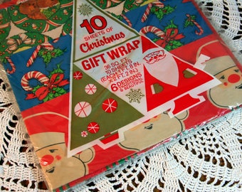 10 sheets of vintage Christmas wrap-mid century-unopened package-Santa-candy cane-reindeer