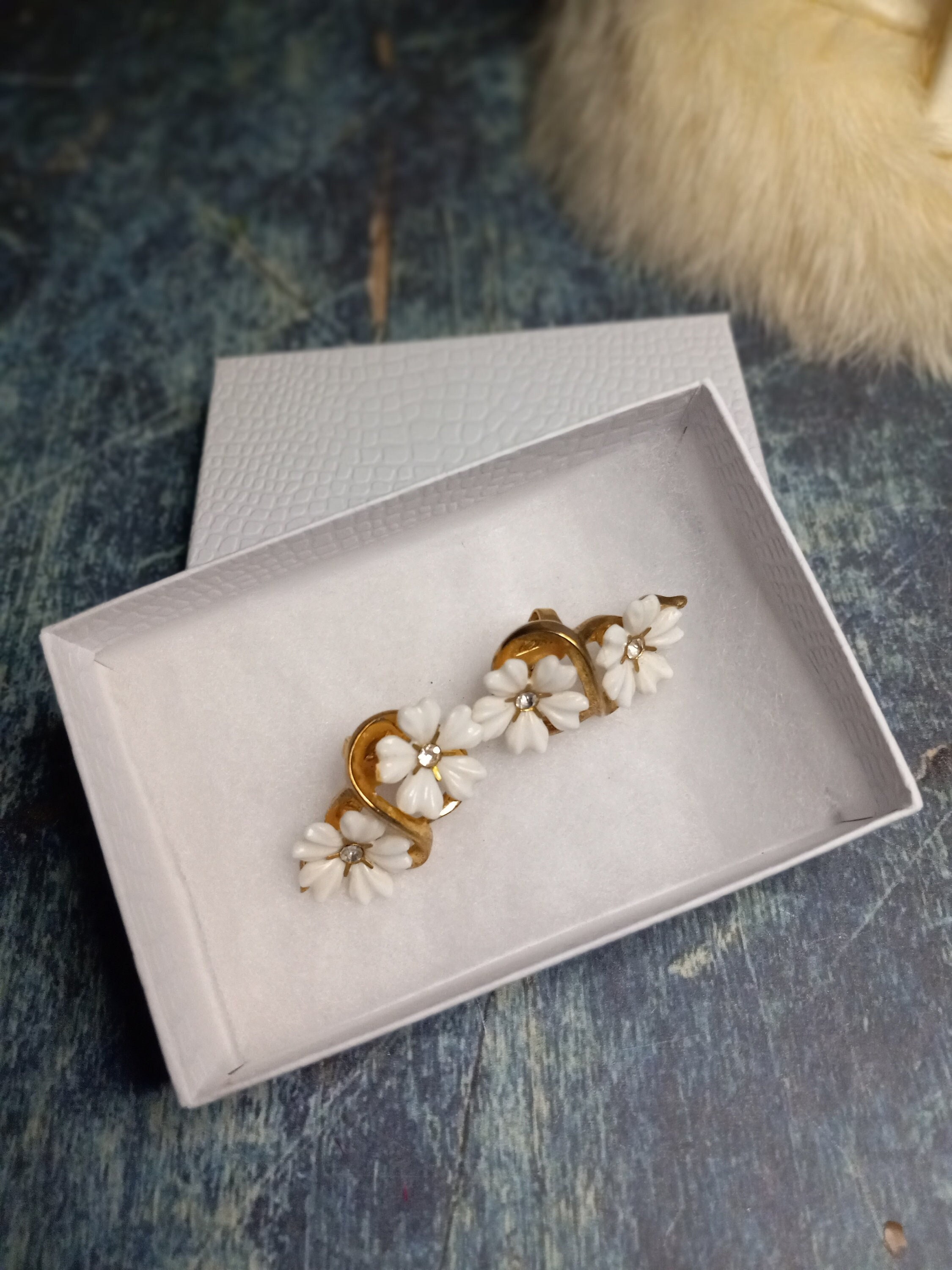 Vintage Trifari clip on earrings-white flower earrings with goldtone setting-clear rhinestone centers-mid century collectible