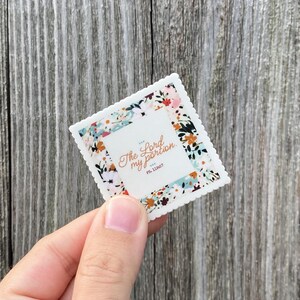 May include: A white sticker with a floral border and the text "The Lord is my portion."  Psalm 119:57.