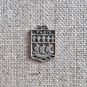 vintage Paris souvenir charm, French symbols coat of arms ship, made in France, silver metal good luck charm, fleur de lys & boat, gift idea