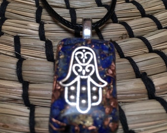 Orgone ASG Hamsa Hand pendant with Shungite, Lapis Lazuli, Copper, Black Tourmaline, 1 1/4 in by 1/4 in rectangle