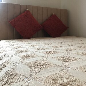 May include: A set of three ceramic mugs with a speckled, matte finish. The mugs are in shades of cream, light gray, and dark gray. Each mug has a simple, minimalist design, perfect for coffee or tea.