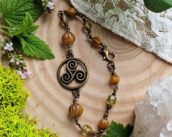 Celtic Triskelion Bracelet, Symbolic Charm Jewelry, Celtic Symbolism Bracelet, Nature-Inspired Fashion, Beaded Jewellery, Unique pagan gift