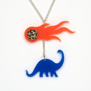 Acrylic dinosaur & falling comet necklace