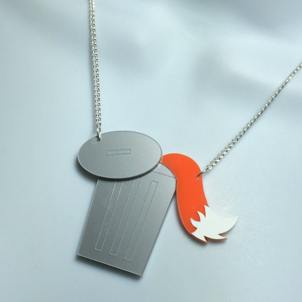 fabulous laser cut 'dustbin raider' quirky necklace