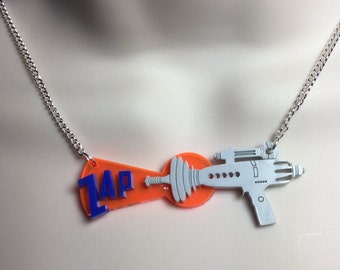 laser cut layered acrylic 'Zapping' ray gun...B movie/Sci-Fi necklace