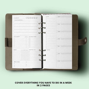 May include: A weekly planner with a brown leather cover. The planner has a black wire-o binding and includes sections for top priorities, assignments, to-read/learn, habits, a shopping list, notes, and a meal plan. The right page has a daily planner with sections for Monday through Sunday.