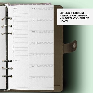 May include: A weekly planner with a brown leather cover. The planner has a white paper insert with a to-do list, notes section, and daily columns for Monday through Sunday. Each day has a section for tasks and a row of stars.