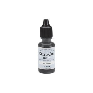 May include: A black StazOn Refill ink bottle with a white label that reads "StazOn Refill Fast drying solvent ink 31 - Black TSUKINEN 0.5 fl oz (15ml)"