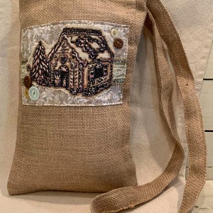 Sac fourre-tout en toile de jute sur le thème de l'hiver avec décoration en tissu appliqué