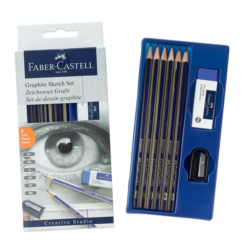 May include: A blue and gold Faber-Castell graphite sketch set with 8 pencils, a pencil sharpener, and an eraser. The set includes pencils in the following grades: 2H, HB, B, 2B, 4B, 6B, 8B, and 119. The set is packaged in a blue plastic case.