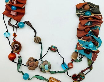 Handmade Adjustable Silk Multi Strand Necklace with Non-Precious Bead Accents and Hand Dyed Yarns, Rust, Aqua and Earth Colors- LRW DESIGNS