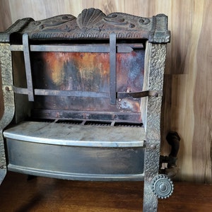 Gas Fireplace Insert OKeefe and Merritt gas heater American Gas Association 1900s vintage Late Victorian parlor heater No 74 3500 BTU