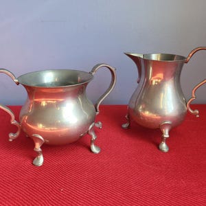 Pewter Williamsburg Cream and sugar Hollowware by Kirk Stieff Pewter CW 83 18 and CW 84 18 Restoration Open sugar bowl pitcher large handles