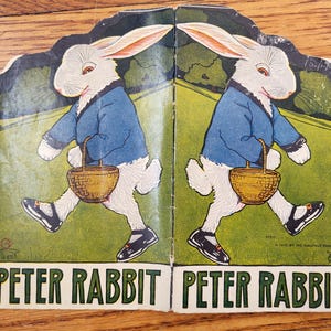 1916 Peter Rabbit by Beatrix Potter paperback Albert illustrator Saalfield Publishing Same story different pictures different colored ink
