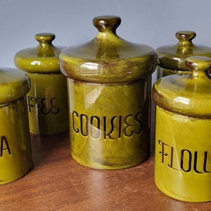 5 Kitchen Canisters Mid Century America Ceramic Holiday Designs Avocado Acorn shape lid High shine glaze Coffee Tea Cookies Flour Sugar