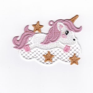 May include: Embroidered patch of a unicorn with a pink mane and tail, a gold horn, and gold stars. The unicorn is on a white cloud-shaped background. The patch is designed for decorative use.