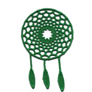 May include: Green dreamcatcher with three feathers hanging from the bottom. The dreamcatcher is made of a delicate, intricate design.