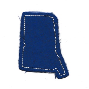 May include: A blue felt state of Alabama patch with white stitching around the outline.