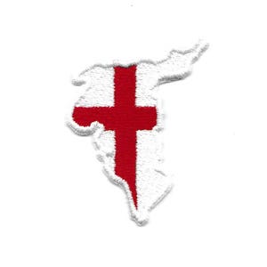 Puede incluir: Parche blanco bordado con forma de la isla de Jersey con una cruz roja en el centro.