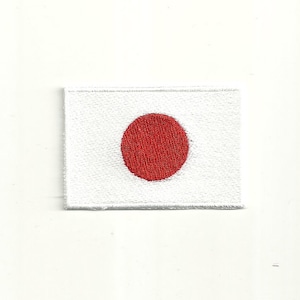 以下が含まれることがあります： 日本の国旗を表す、中央に赤い円がある白い刺繍パッチ