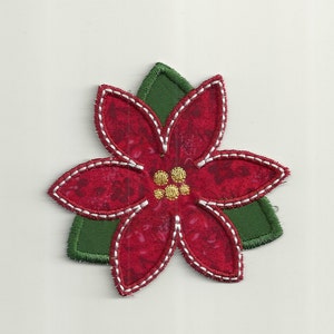 May include: A red poinsettia flower with a green leaf, embroidered with silver thread and gold accents.