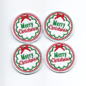 May include: Four white felt circles with red and green embroidery. Each circle features a red bow and the text "Merry Christmas" in green.