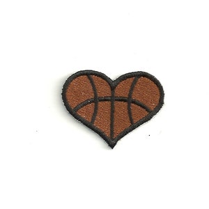 May include: Brown and black embroidered patch shaped like a heart with a basketball design inside.