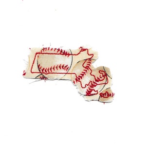 May include: A fabric patch in the shape of the state of Massachusetts, with a baseball design. The patch is cream colored with red stitching and is slightly frayed around the edges.