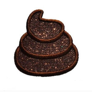 May include: A brown glitter poop emoji patch. The patch is made of felt and has a brown glitter finish.
