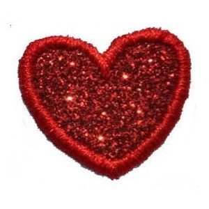 May include: Red glitter heart-shaped patch with a red embroidered outline.