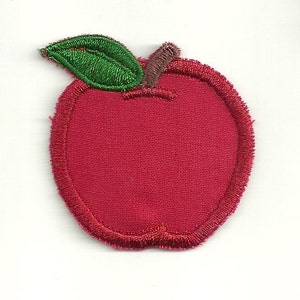 May include: Red felt apple applique with a green felt leaf and brown felt stem.