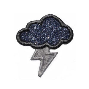 May include: A black glitter cloud with a silver lightning bolt underneath. The cloud is a patch or iron-on.