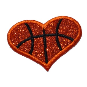 May include: Orange and black glitter heart-shaped patch with a basketball design.