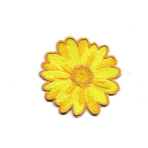 May include: A yellow embroidered flower patch with a brown outline.
