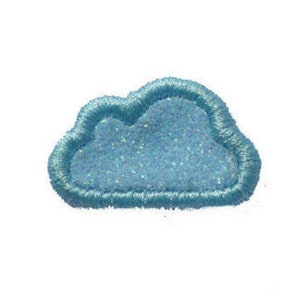 May include: A light blue cloud-shaped patch with a sparkly texture. The patch is outlined in a darker blue thread.