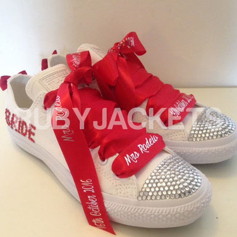 converse with red laces