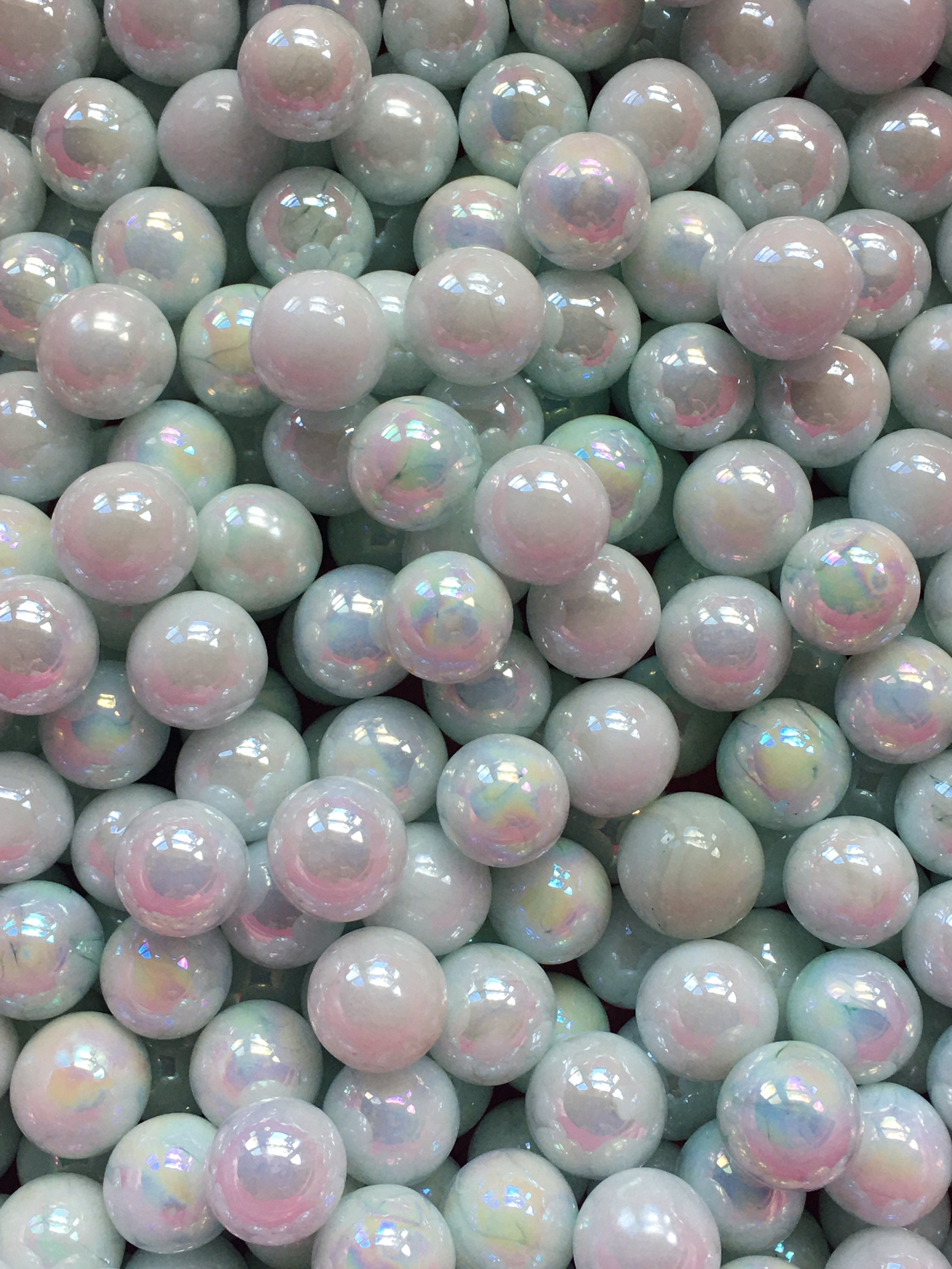 + or - 50 CHAMPION 9/16" LUSTER PEARL WHITE MARBLES   $4.99 