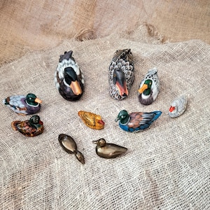 Vintage eendfiguurtjes: keramiek, messing en hout, miniatuurtuindecor