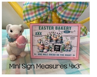 Easter Bakery one mile ahead on the right mini wood sign for Easter tiered trsys