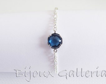 Silver Plated Bracelet with sparkling sapphire round blue faceted glass in rhodium plated framing