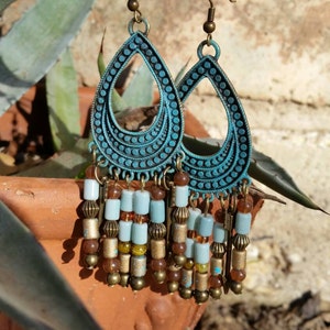 Tribal chandelier style earrings made with gorgeous glass beads! Handmade, only one available!