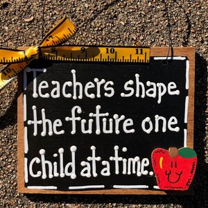 Teacher Gift  5559 Teachers shape the future one child at a time  wood sign