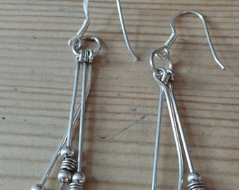 Two pairs of sterling silver earrings