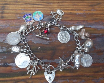 FREE SHIPPING vintage sterling silver charm bracelet with 15 coins and charms
